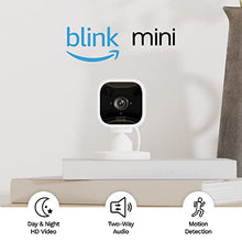 Load image into Gallery viewer, Blink Mini – Compact indoor plug-in smart security camera, 1080p HD video, night vision, motion detection, two-way audio, easy set up, Works with Alexa – 2 cameras (White)
