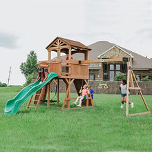 Load image into Gallery viewer, Backyard Discovery Sterling Point All Cedar Wooden Swing Set, Raised Clubhouse, Green Wave Slide, Web Swing, Climbing Wall, 10ft Wave Slide, 2 Belt Swings, Front Porch, Bridge
