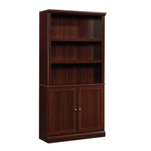 Load image into Gallery viewer, Sauder Miscellaneous Storage Bookcase With Doors/ book shelf, Select Cherry finish
