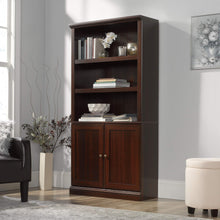 Load image into Gallery viewer, Sauder Miscellaneous Storage Bookcase With Doors/ book shelf, Select Cherry finish
